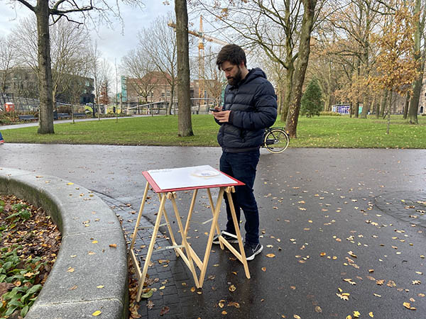 man visiting lo-fi table prototype